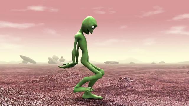 Green Alien Dancing in an Alien Landscape